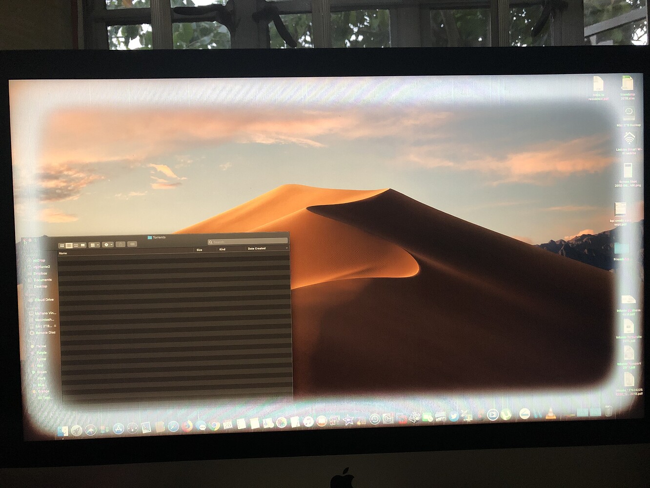 Strange iMac screen failure with a white border around the image